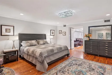 a bedroom with a bed and closet