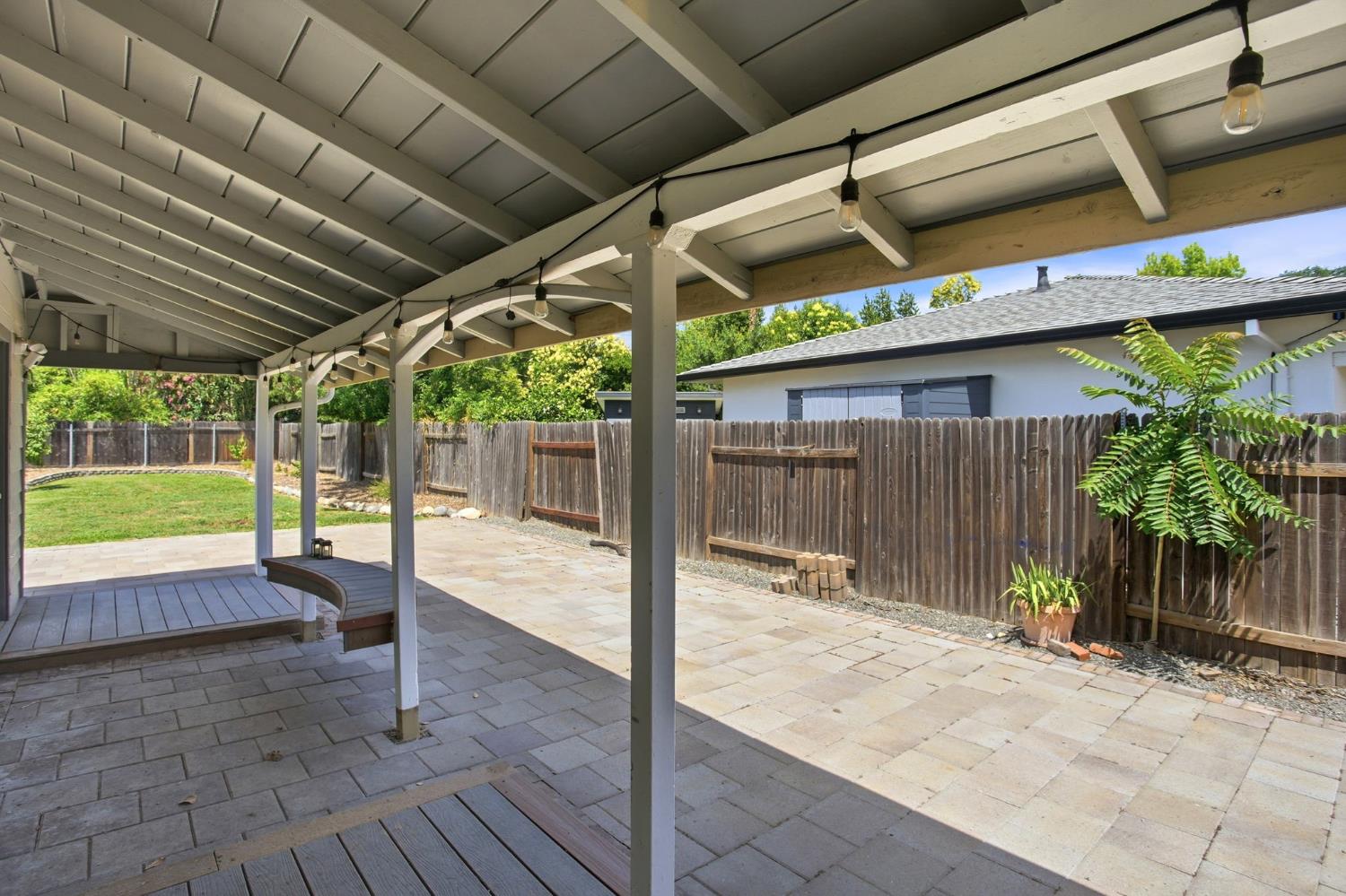 4617 Robertson Avenue Sacramento, CA 95821 - Photo 27 of 37 Covered patio area with built-in bench is perfect for entertaining...right off of the dining area and kitchen.