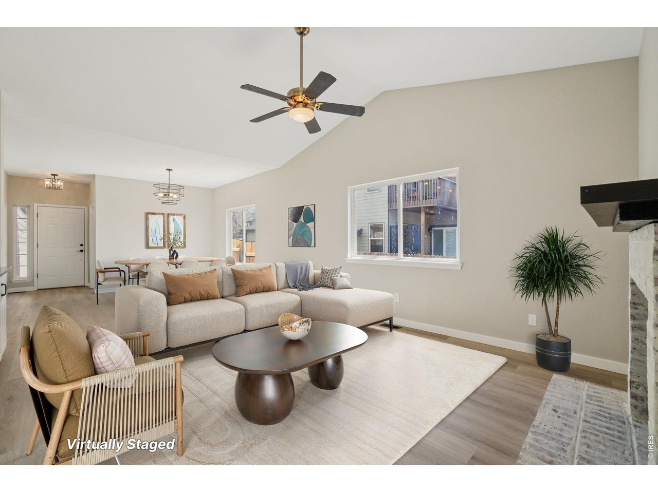 From the nook, view of the family room and formal dining area