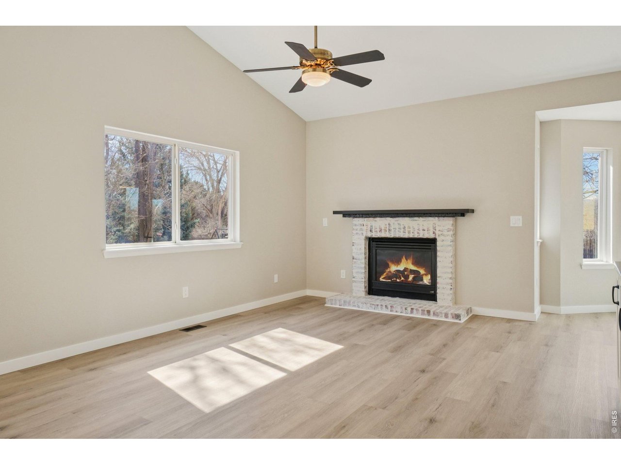 Living room with gas fireplace.