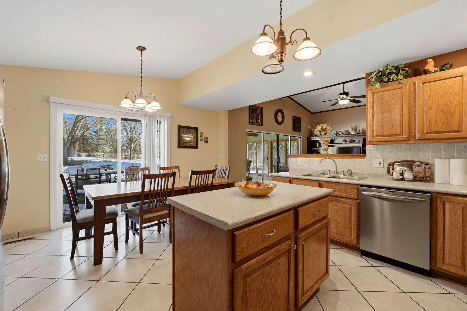 1317 North Cedar Lake Road Lake Villa, IL 60046 - Photo 12 of 25 a kitchen with a table chairs and microwave