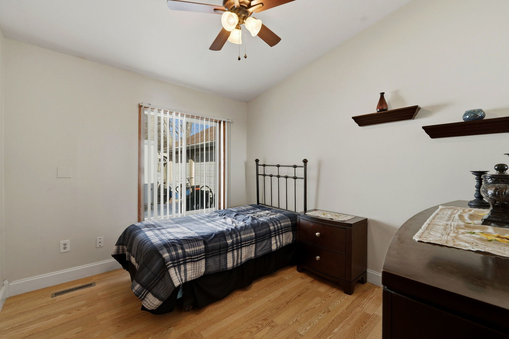1317 North Cedar Lake Road Lake Villa, IL 60046 - Photo 15 of 25 a bedroom with a bed and a window