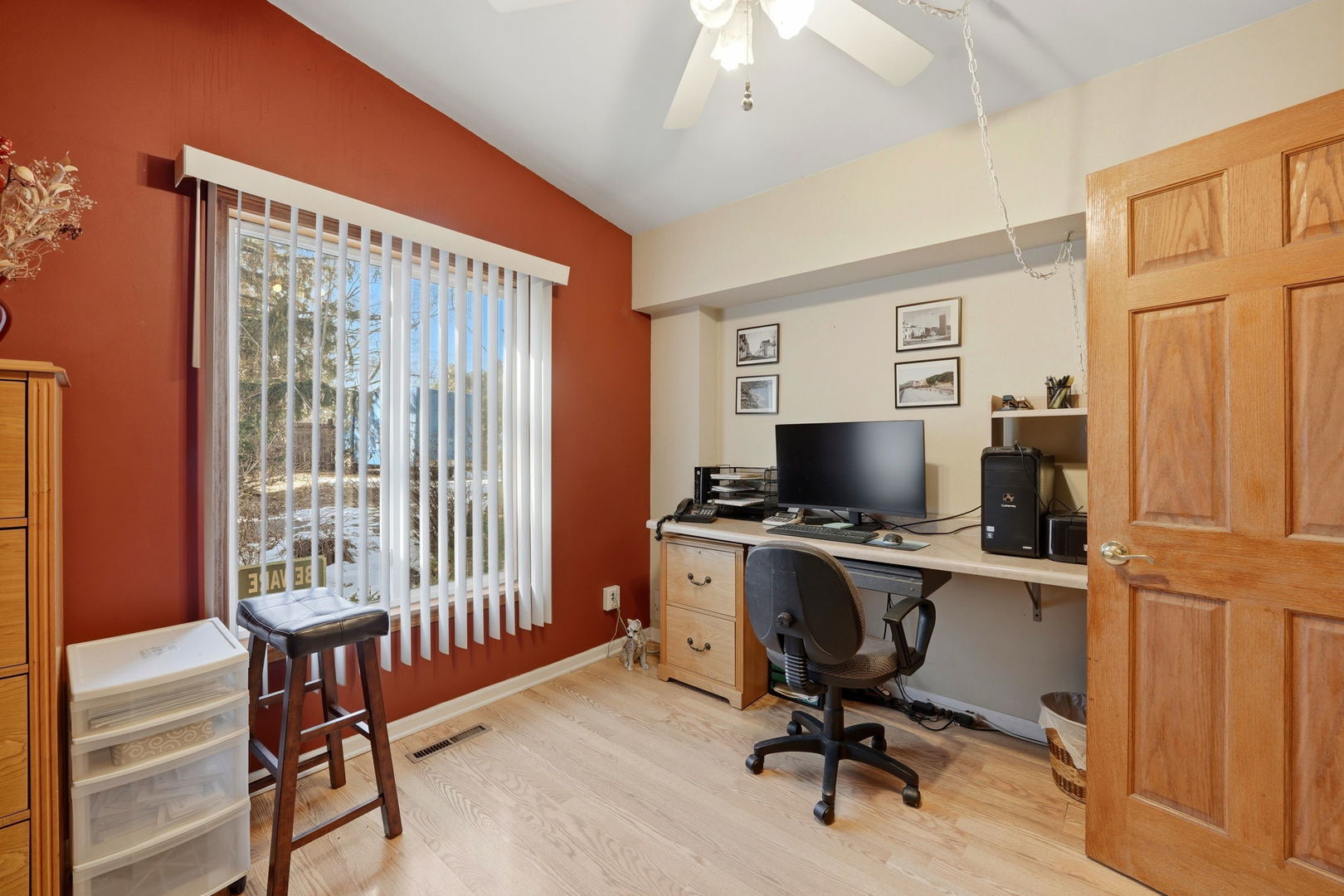 1317 North Cedar Lake Road Lake Villa, IL 60046 - Photo 17 of 25 a view of a workspace with furniture and a window