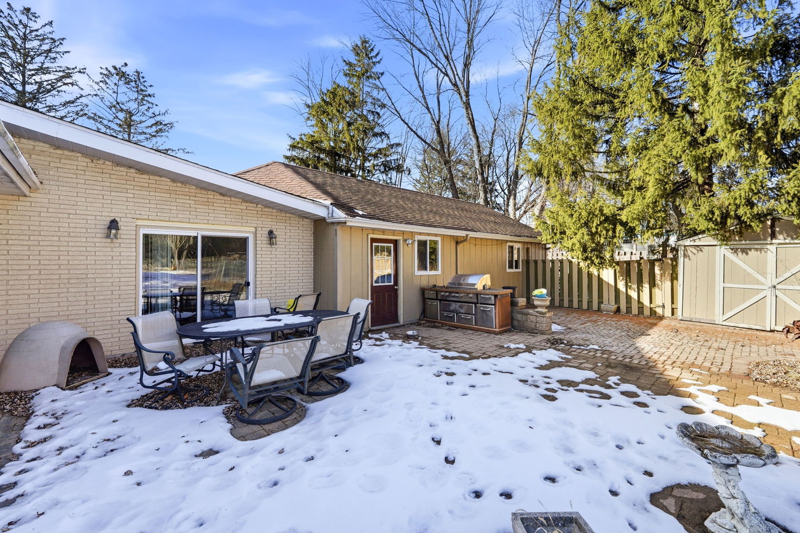 1317 North Cedar Lake Road Lake Villa, IL 60046 - Photo 22 of 25 a view of a house with backyard porch and sitting area
