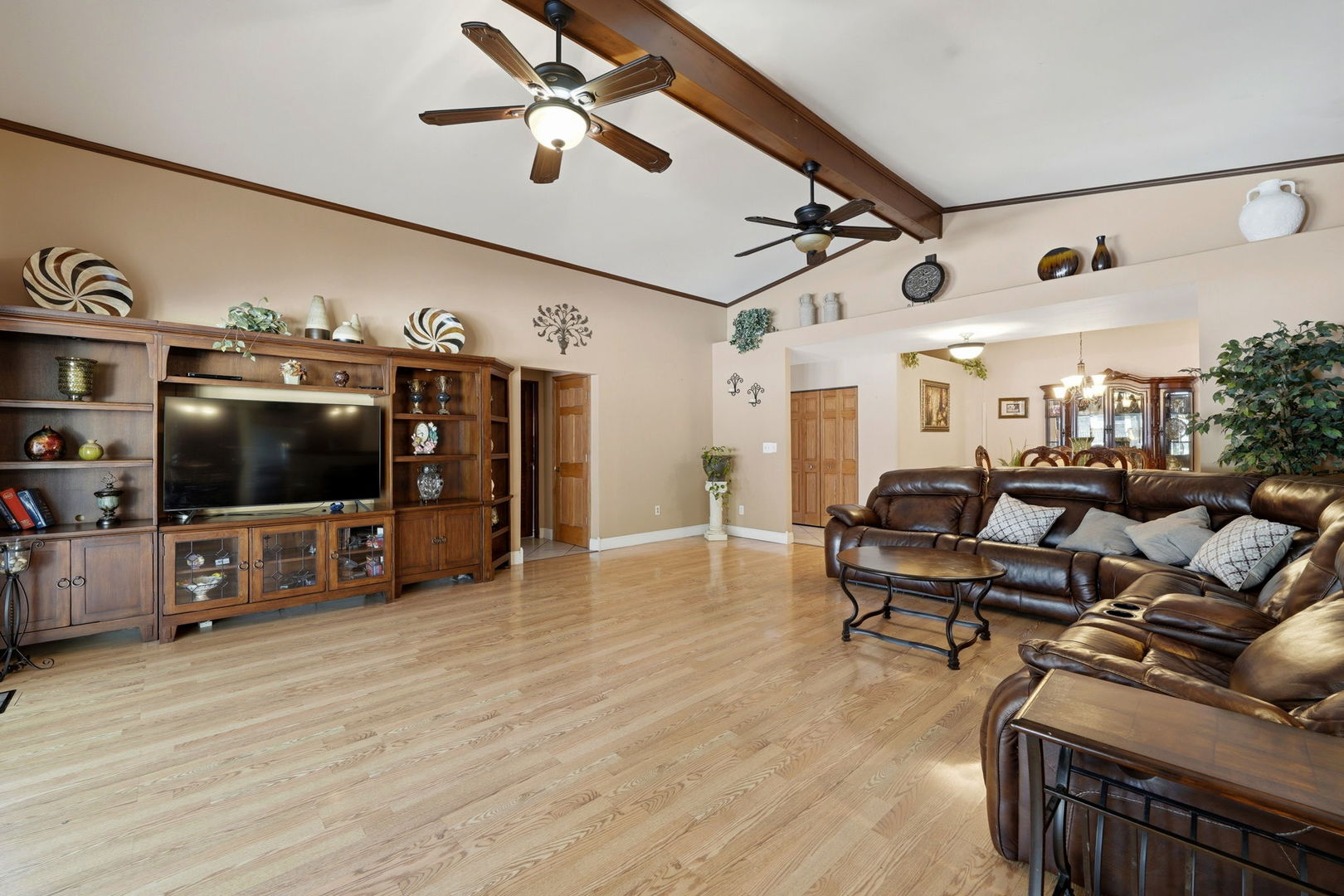 1317 North Cedar Lake Road Lake Villa, IL 60046 - Photo 9 of 25 a living room with furniture and a flat screen tv