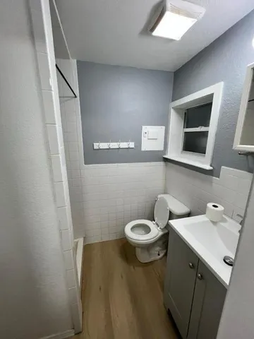 a bathroom with a sink and a toilet