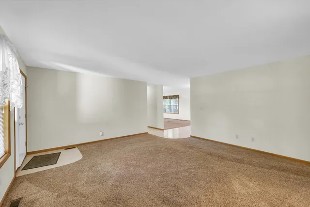 a view of a livingroom with a window