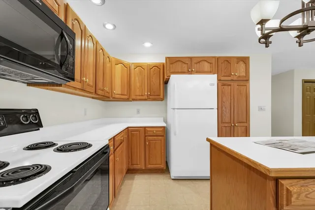 an empty room with ceiling fan