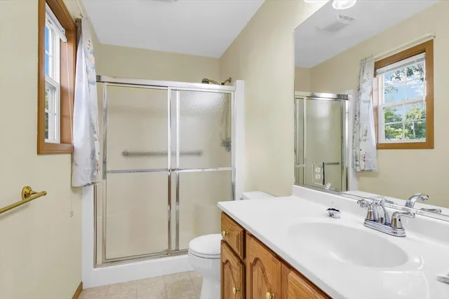 a view of front of a house with a yard