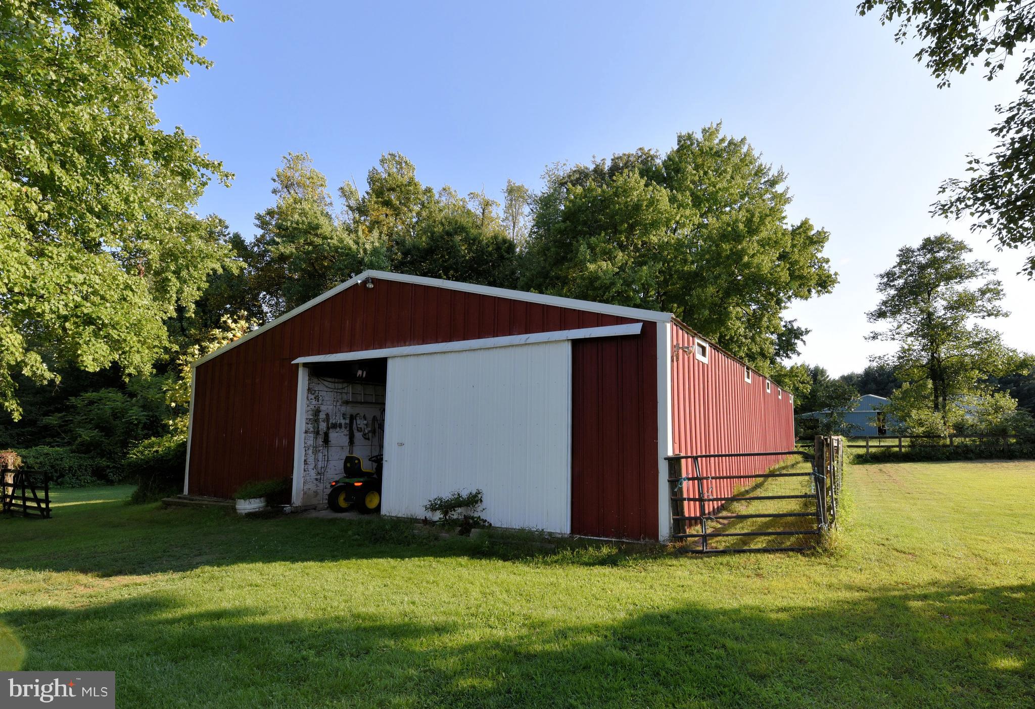 910 Warburton Road Elkton, MD 21921 - Photo 6 of 22 Spacious 9 stall metal pole barn
