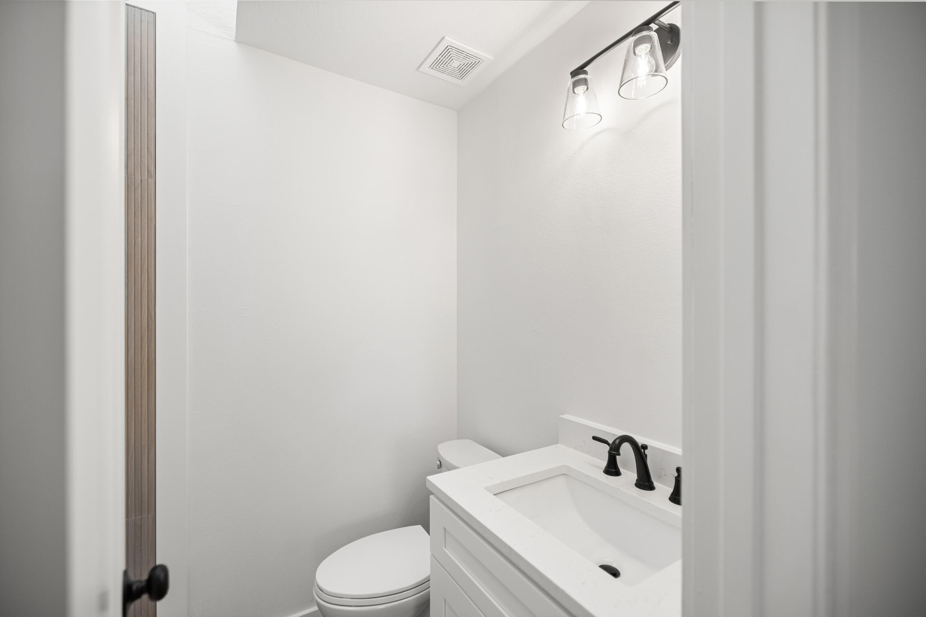 103 Perdido Circle Niceville, FL 32578 - Photo 14 of 71 a bathroom with a sink toilet and shower