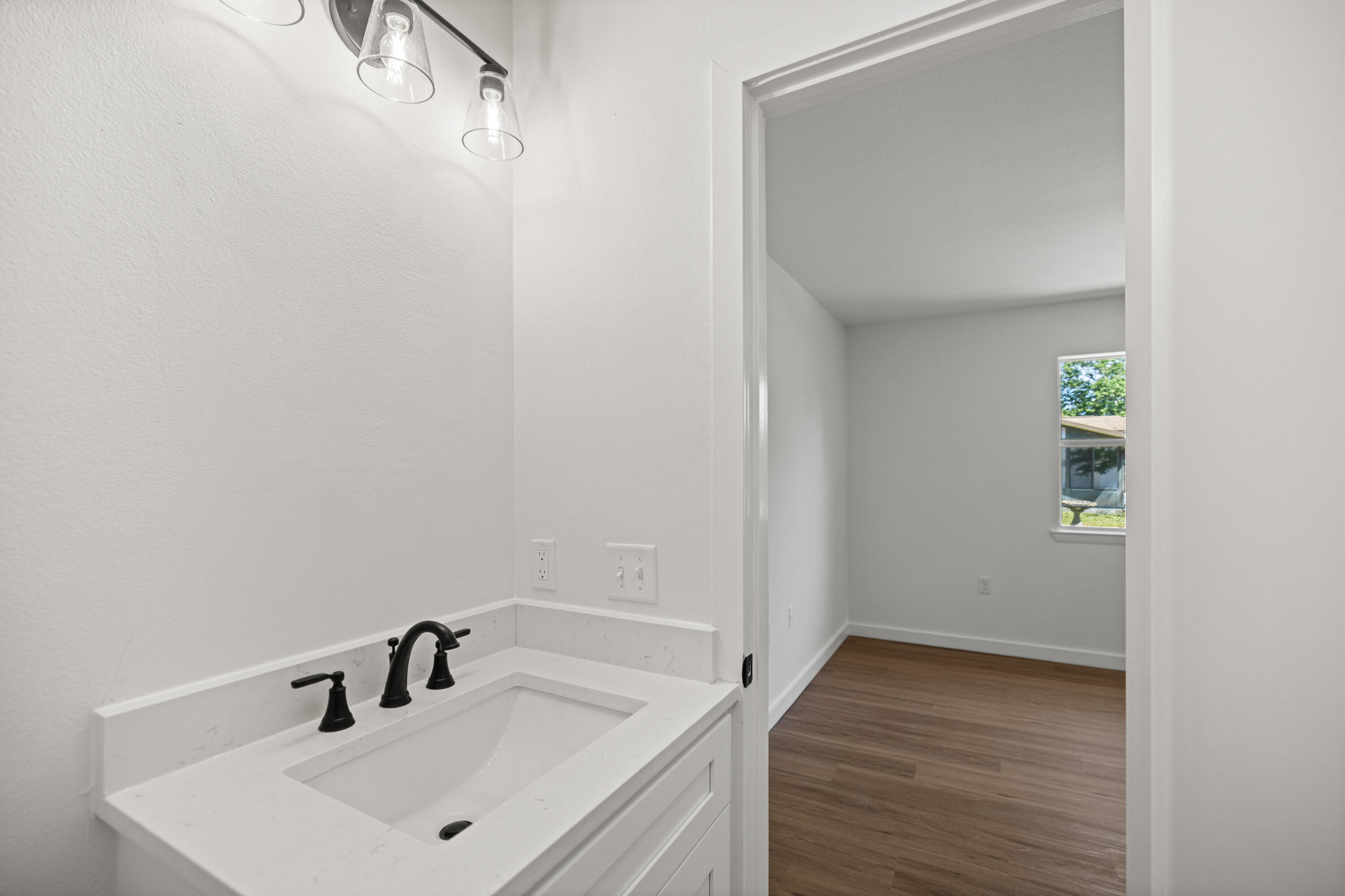 103 Perdido Circle Niceville, FL 32578 - Photo 17 of 71 a bathroom with a sink and vanity