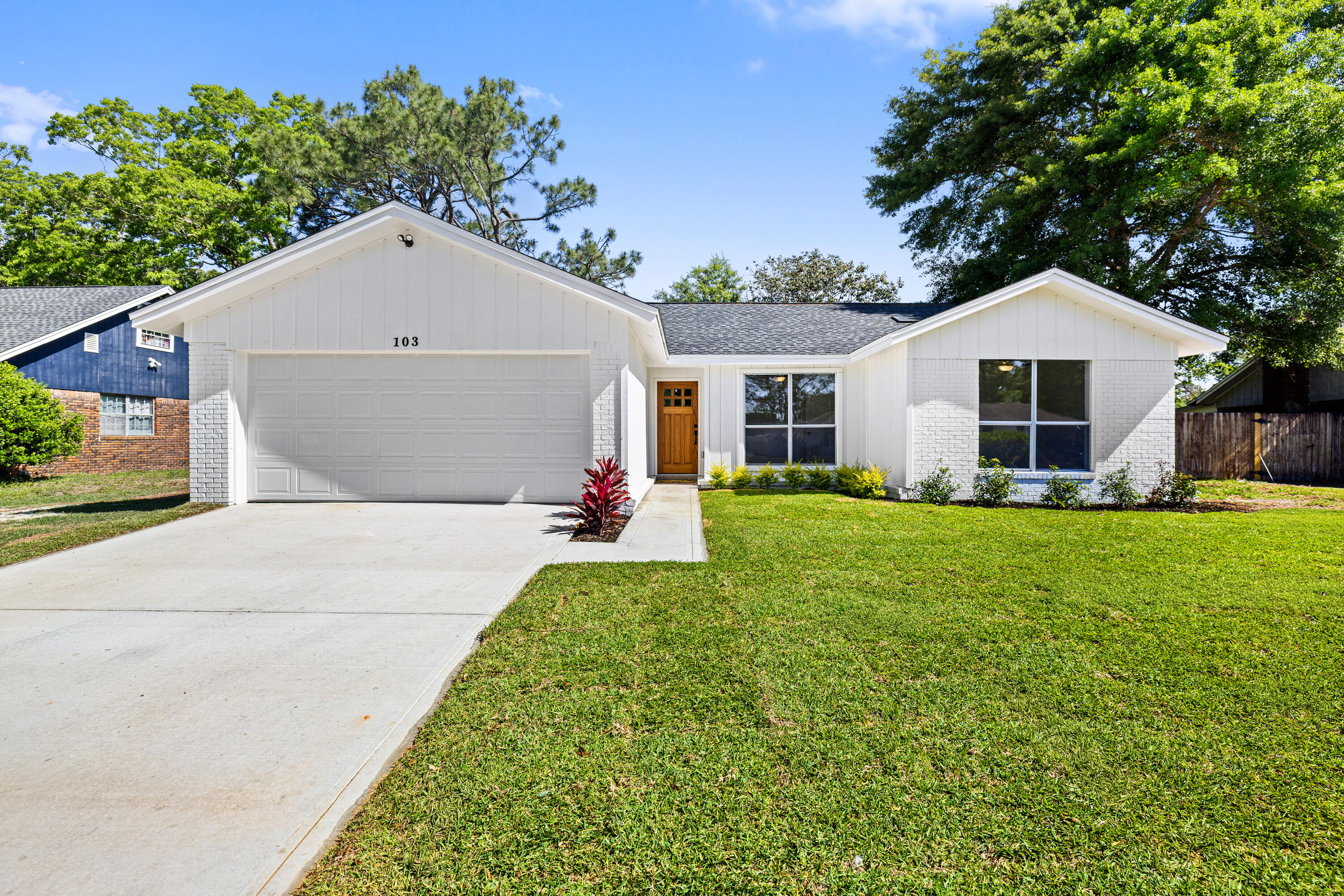 103 Perdido Circle Niceville, FL 32578 - Photo 2 of 71 a front view of house with yard and green space