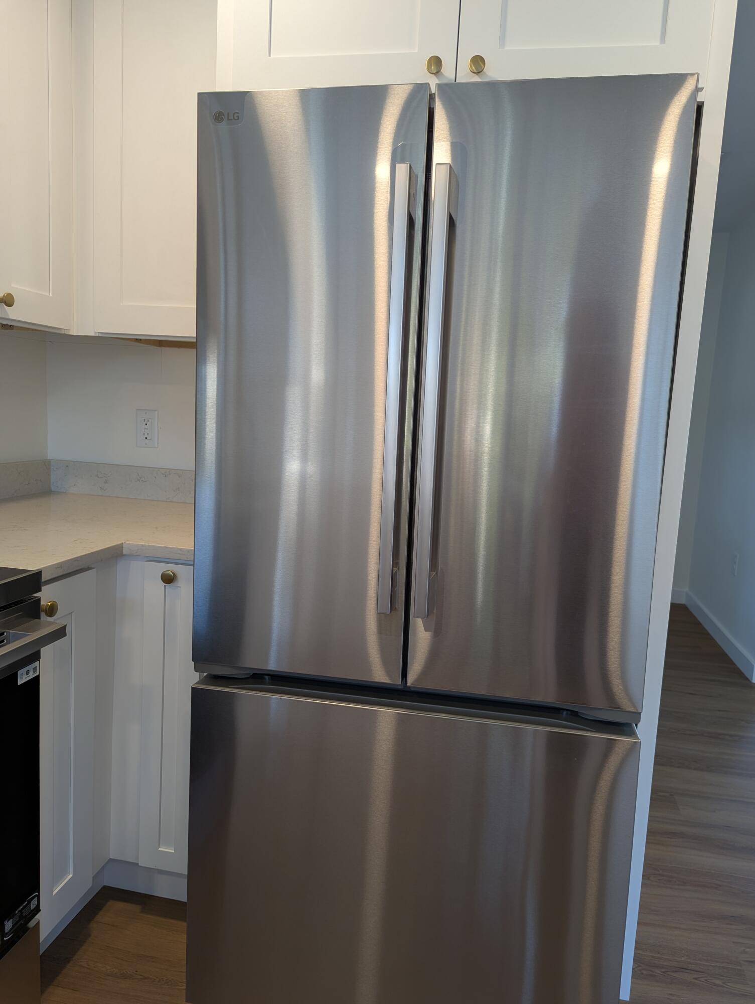 103 Perdido Circle Niceville, FL 32578 - Photo 23 of 71 an empty refrigerator freezer sitting inside of a kitchen