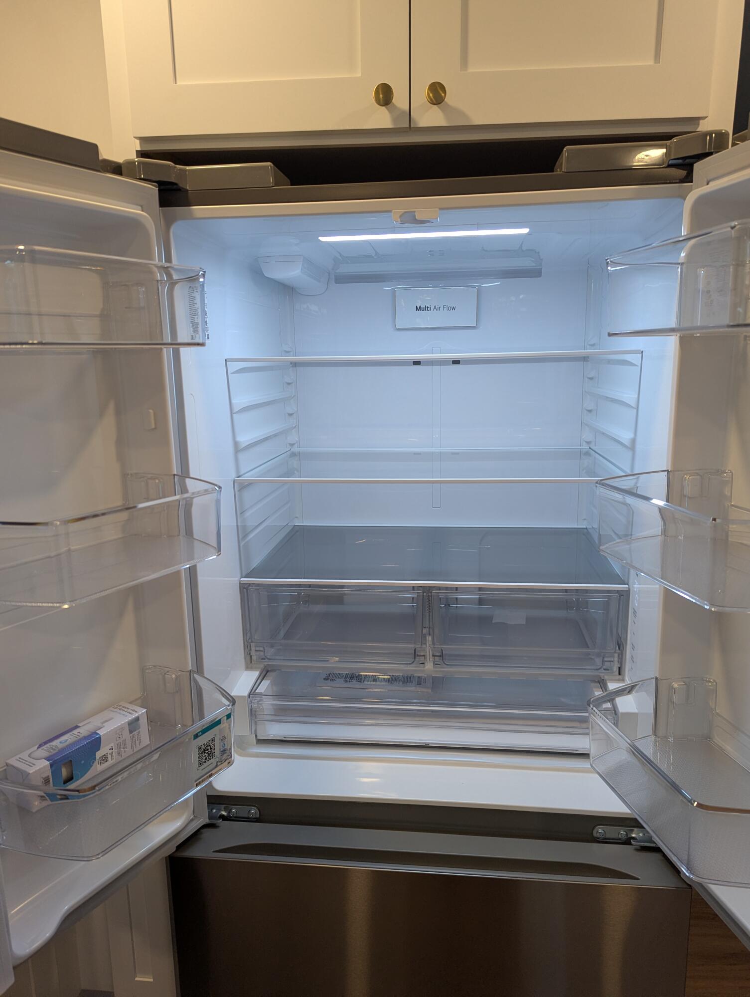 103 Perdido Circle Niceville, FL 32578 - Photo 25 of 71 a refrigerator in a kitchen