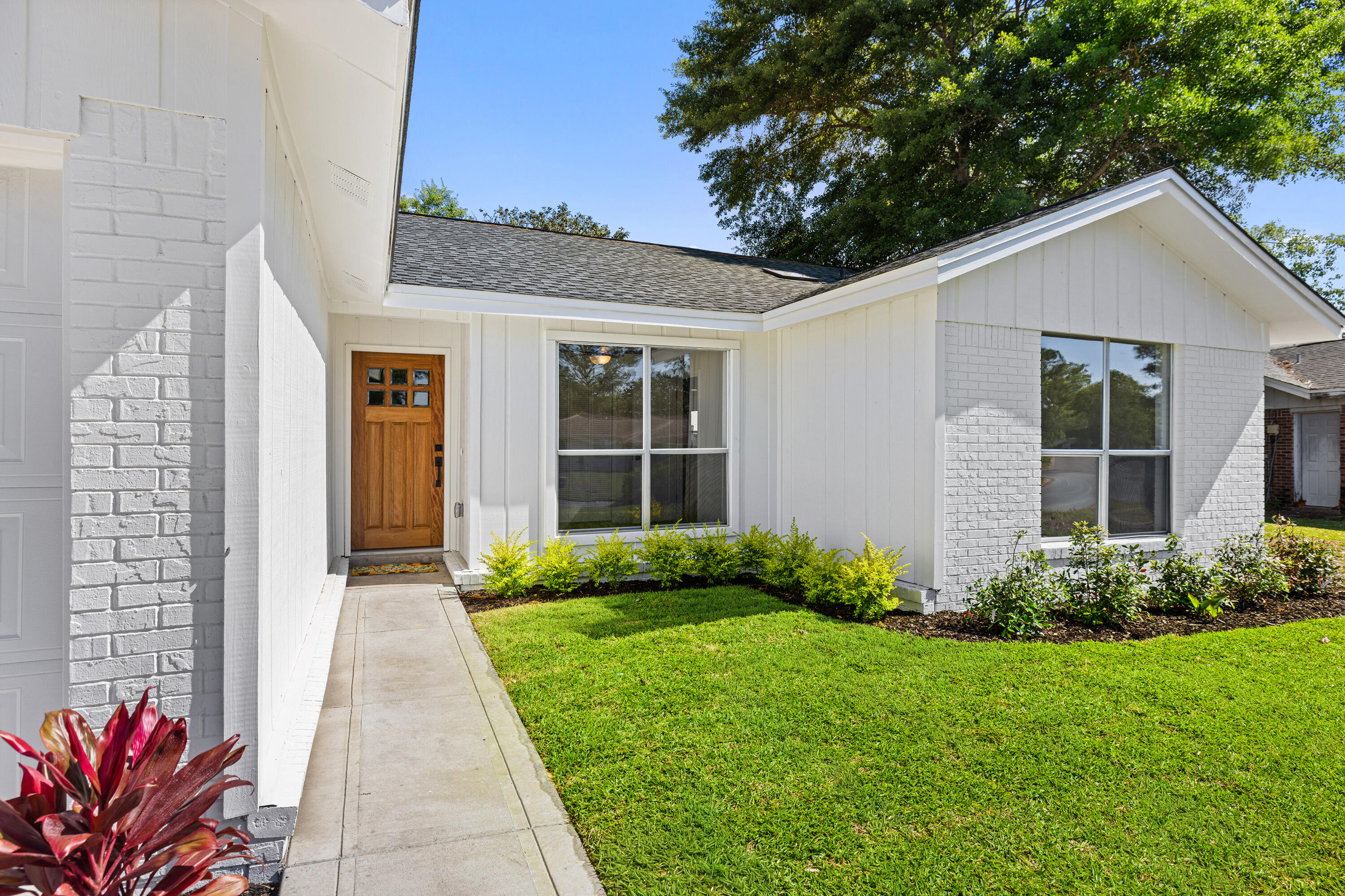 103 Perdido Circle Niceville, FL 32578 - Photo 3 of 71 a view of a house with garden