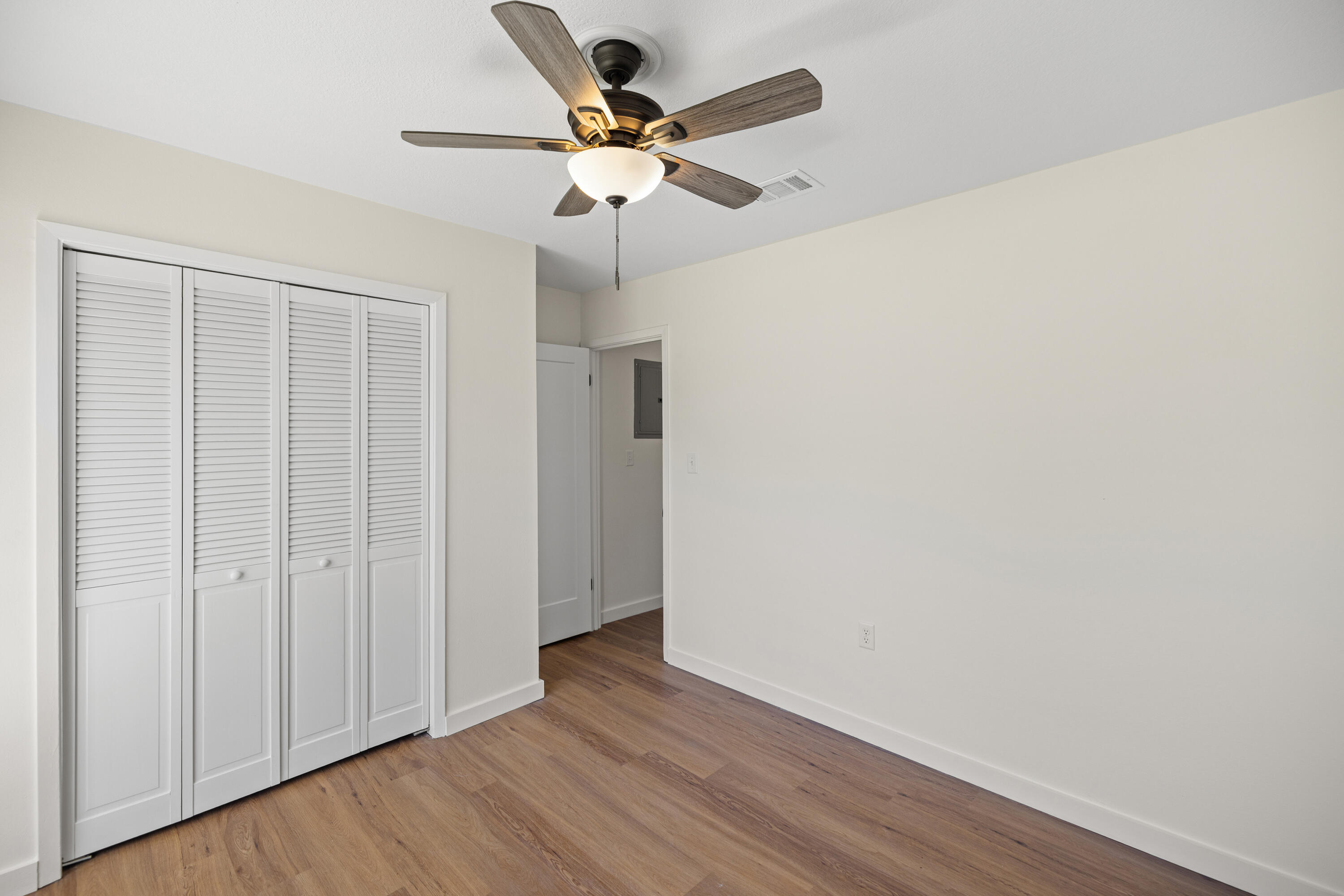 103 Perdido Circle Niceville, FL 32578 - Photo 44 of 71 wooden floor in an empty room