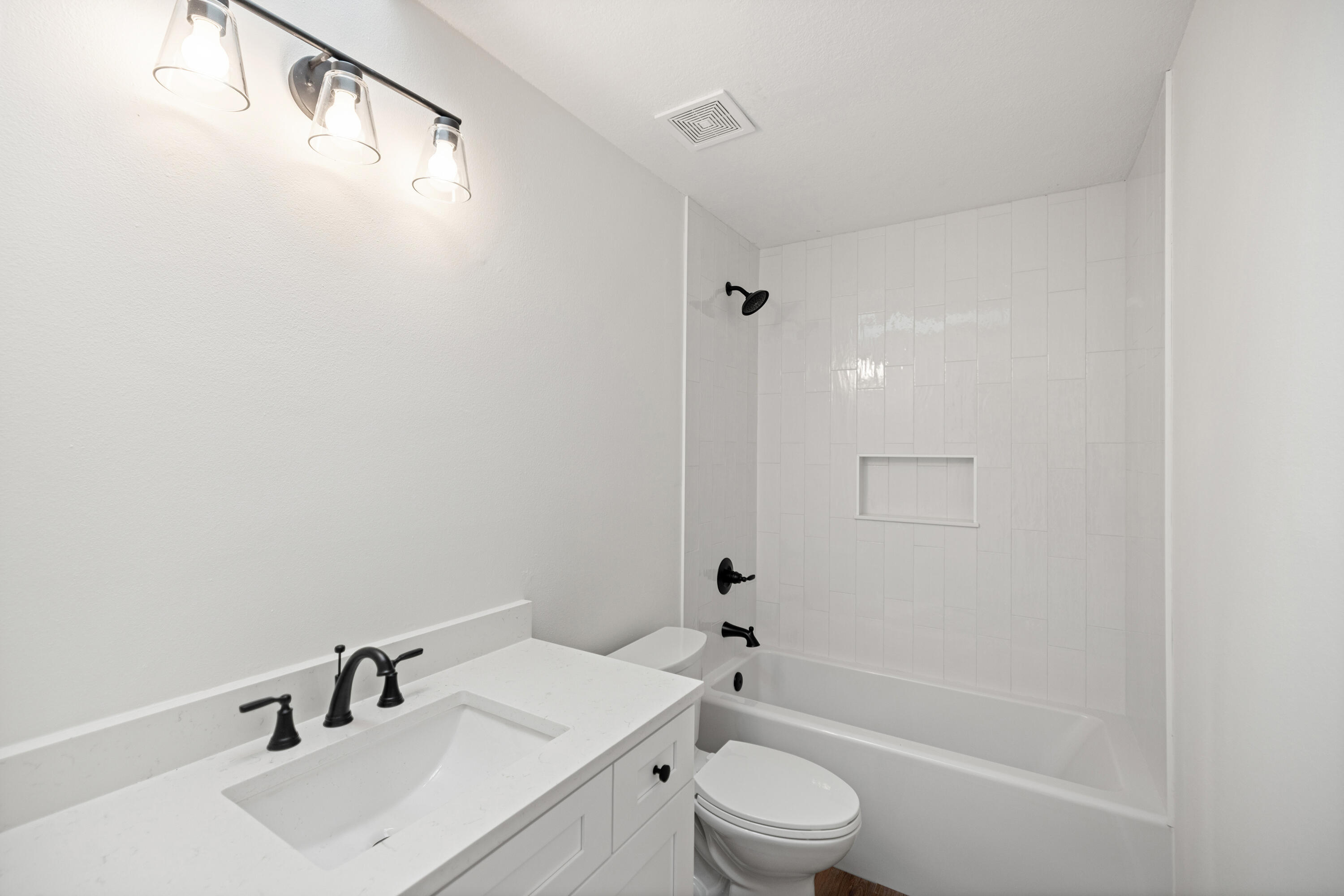 103 Perdido Circle Niceville, FL 32578 - Photo 45 of 71 a bathroom with a sink toilet and shower
