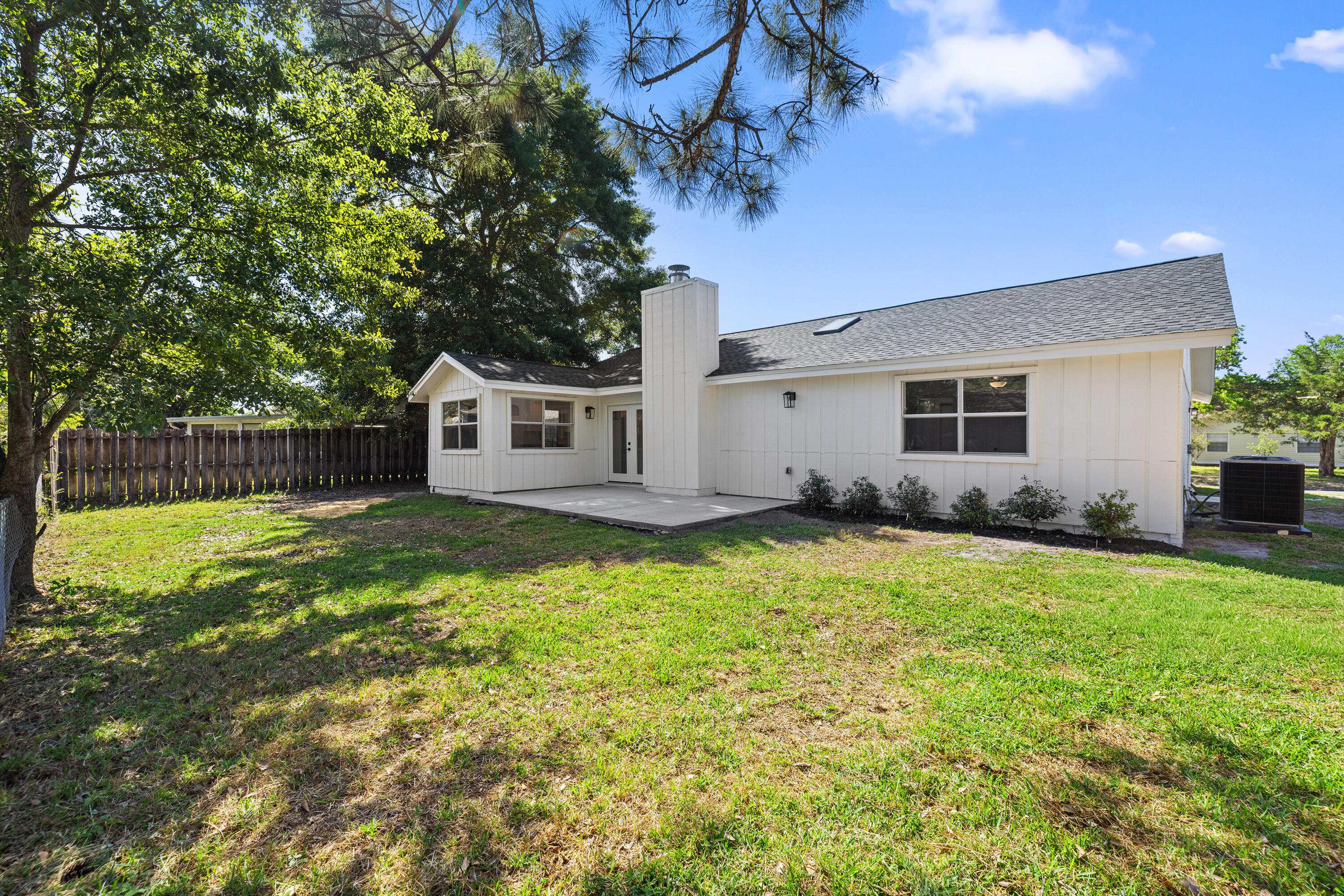 103 Perdido Circle Niceville, FL 32578 - Photo 52 of 71 a view of a house with a backyard