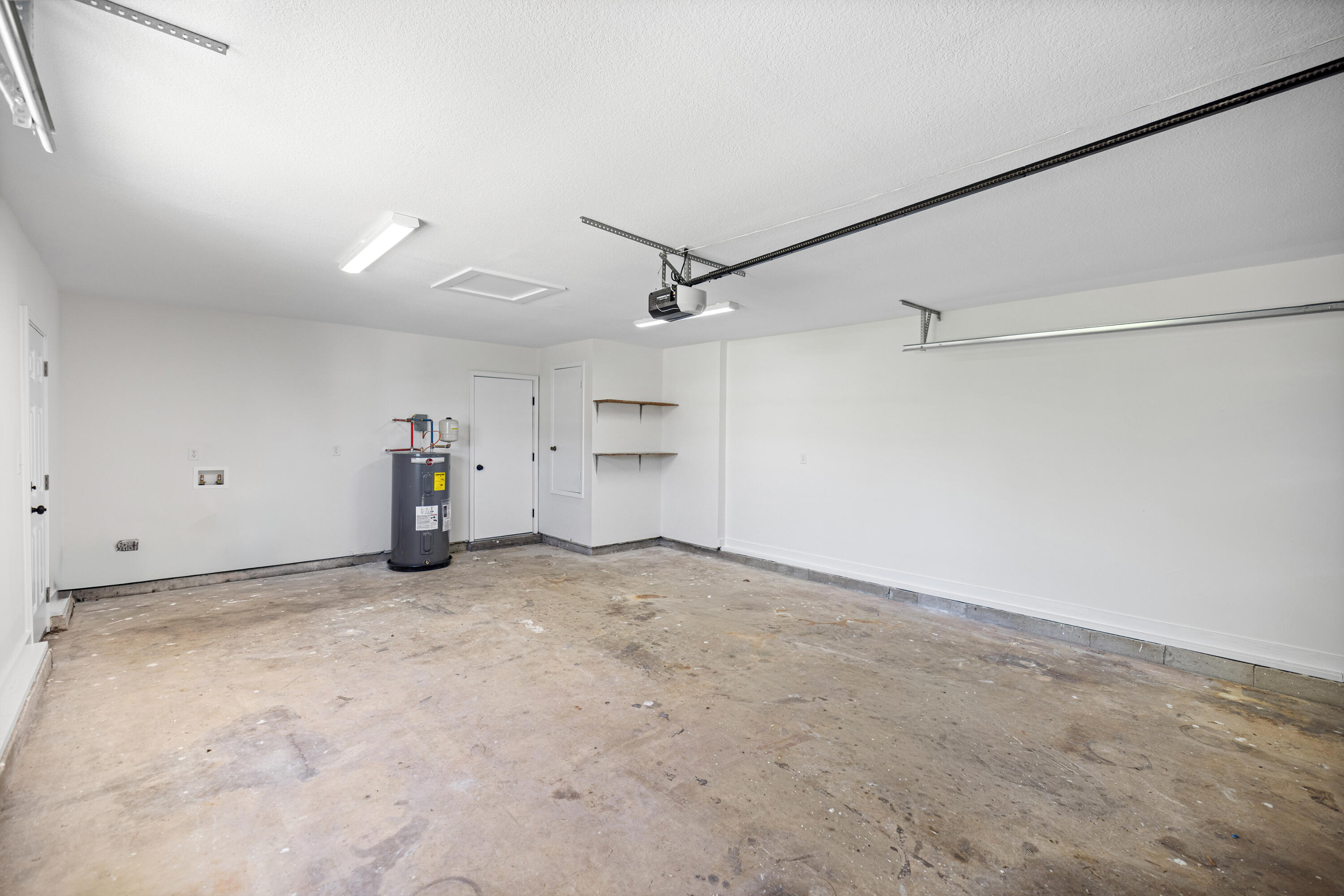 103 Perdido Circle Niceville, FL 32578 - Photo 55 of 71 a view of a storage & utility room with refrigerator and windows