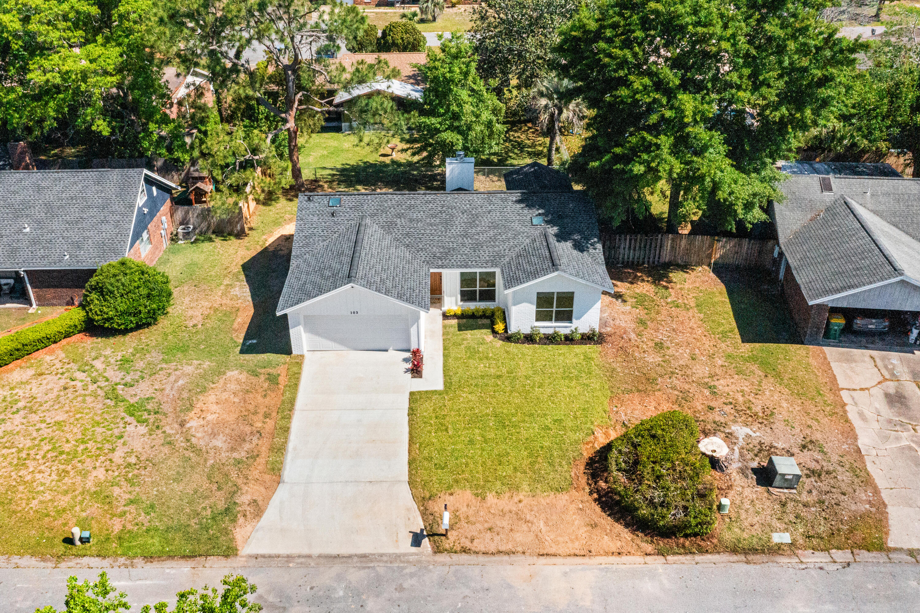 103 Perdido Circle Niceville, FL 32578 - Photo 66 of 71 a front view of a house with a yard