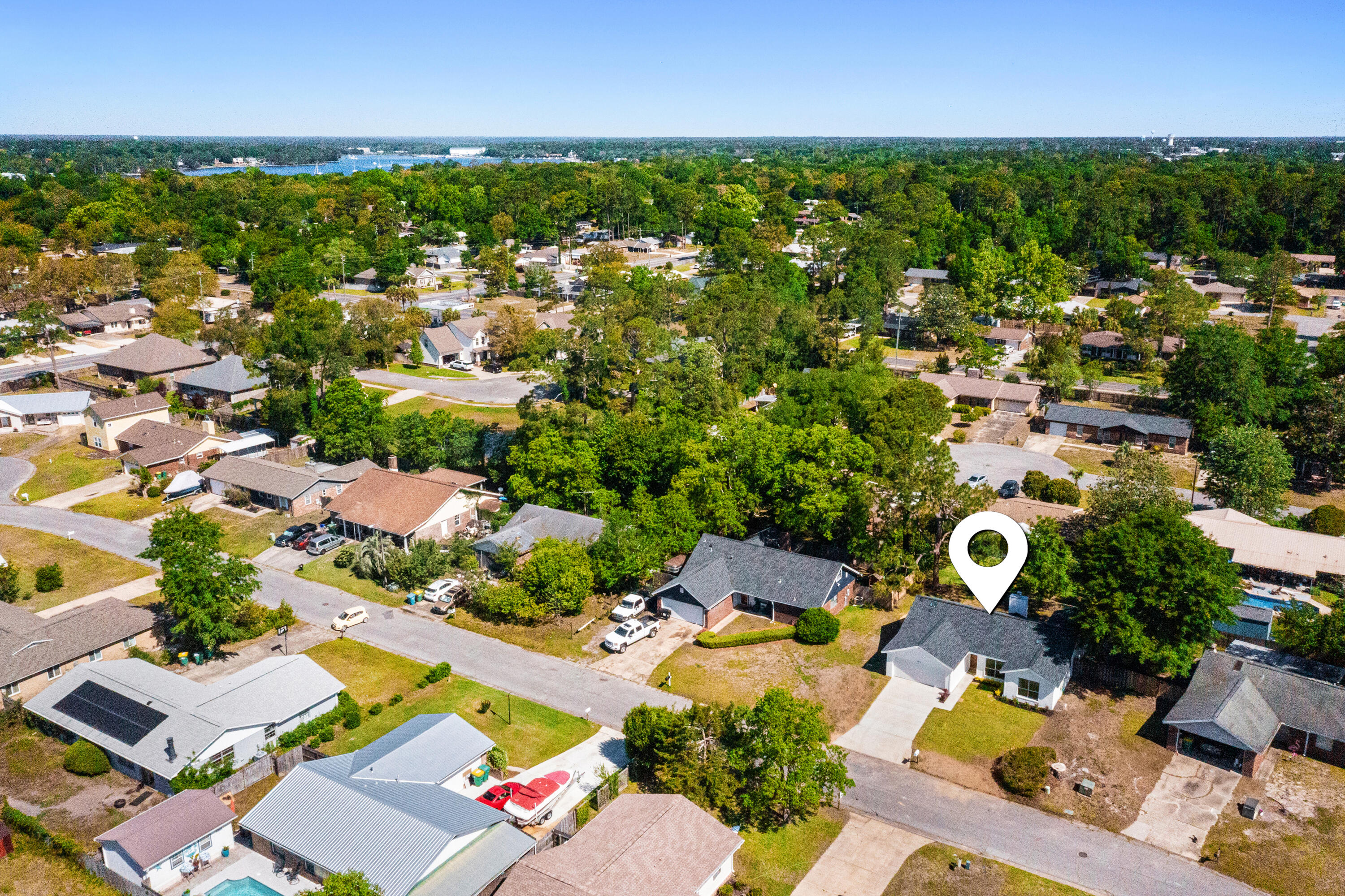 103 Perdido Circle Niceville, FL 32578 - Photo 68 of 71 an aerial view of residential houses with outdoor space