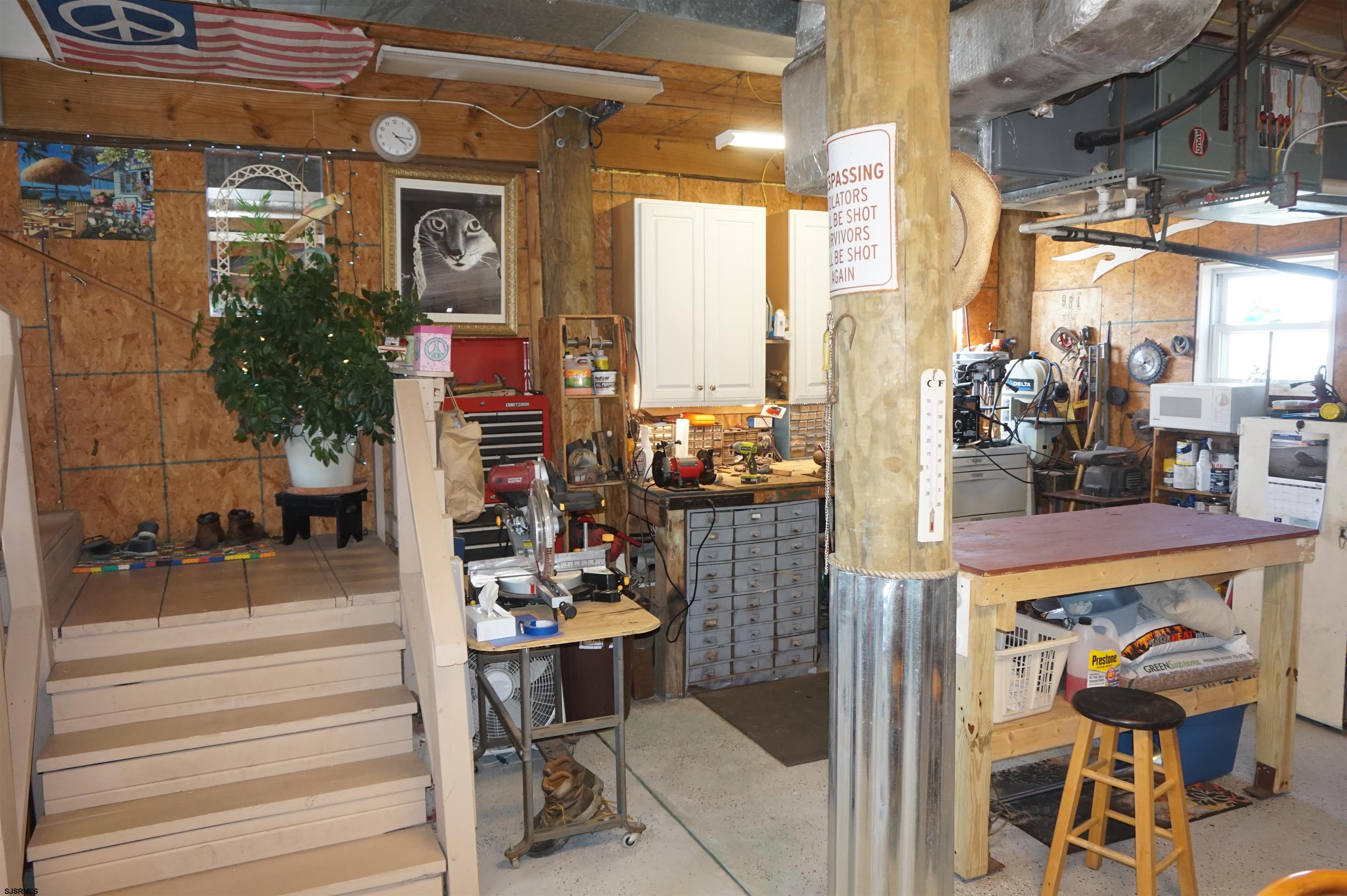 77 Delaware Avenue Fortescue, NJ 08321 - Photo 23 of 47 a view of a chairs and table in a patio