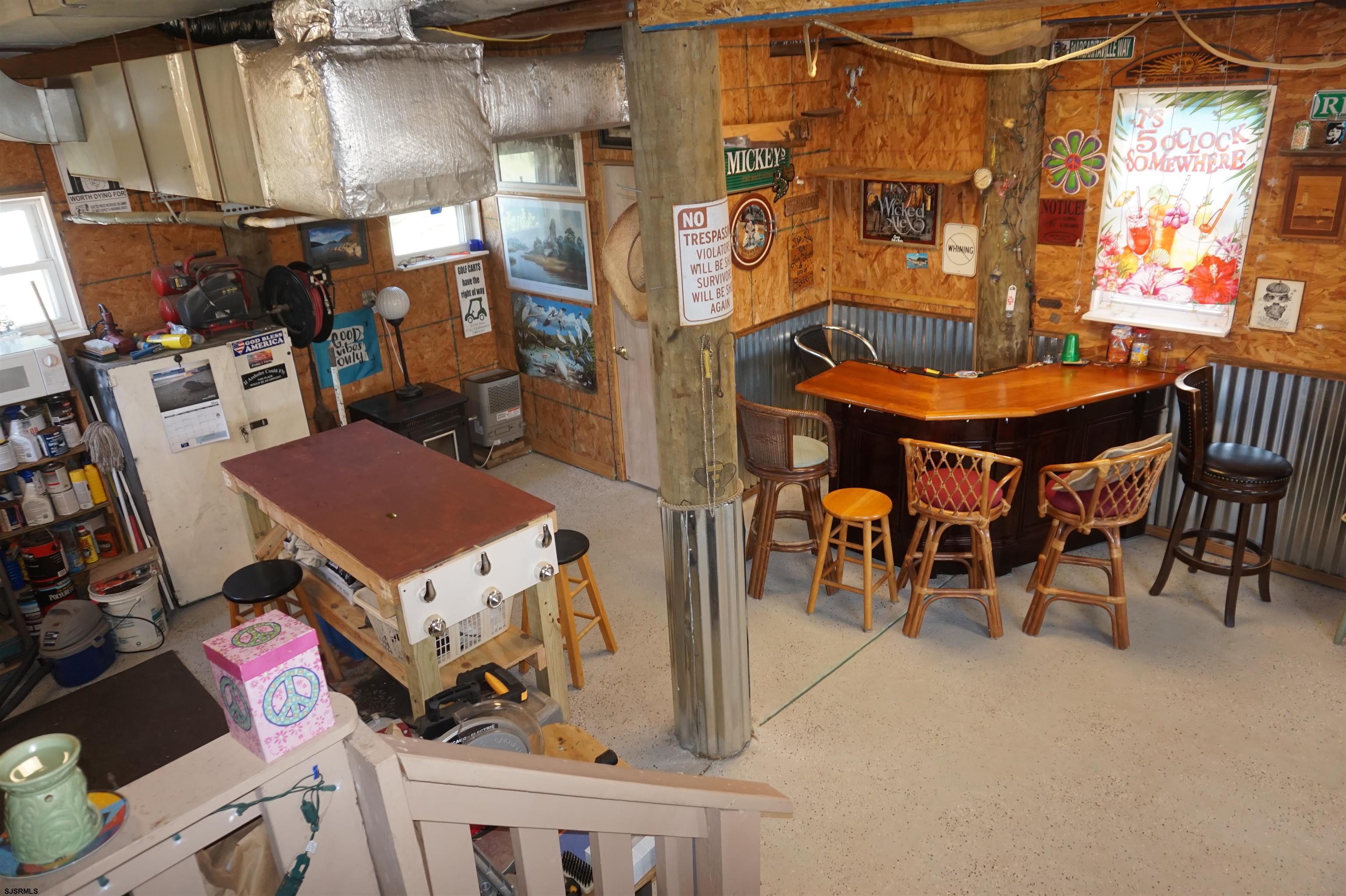 77 Delaware Avenue Fortescue, NJ 08321 - Photo 25 of 47 a view of a chairs and table in a patio