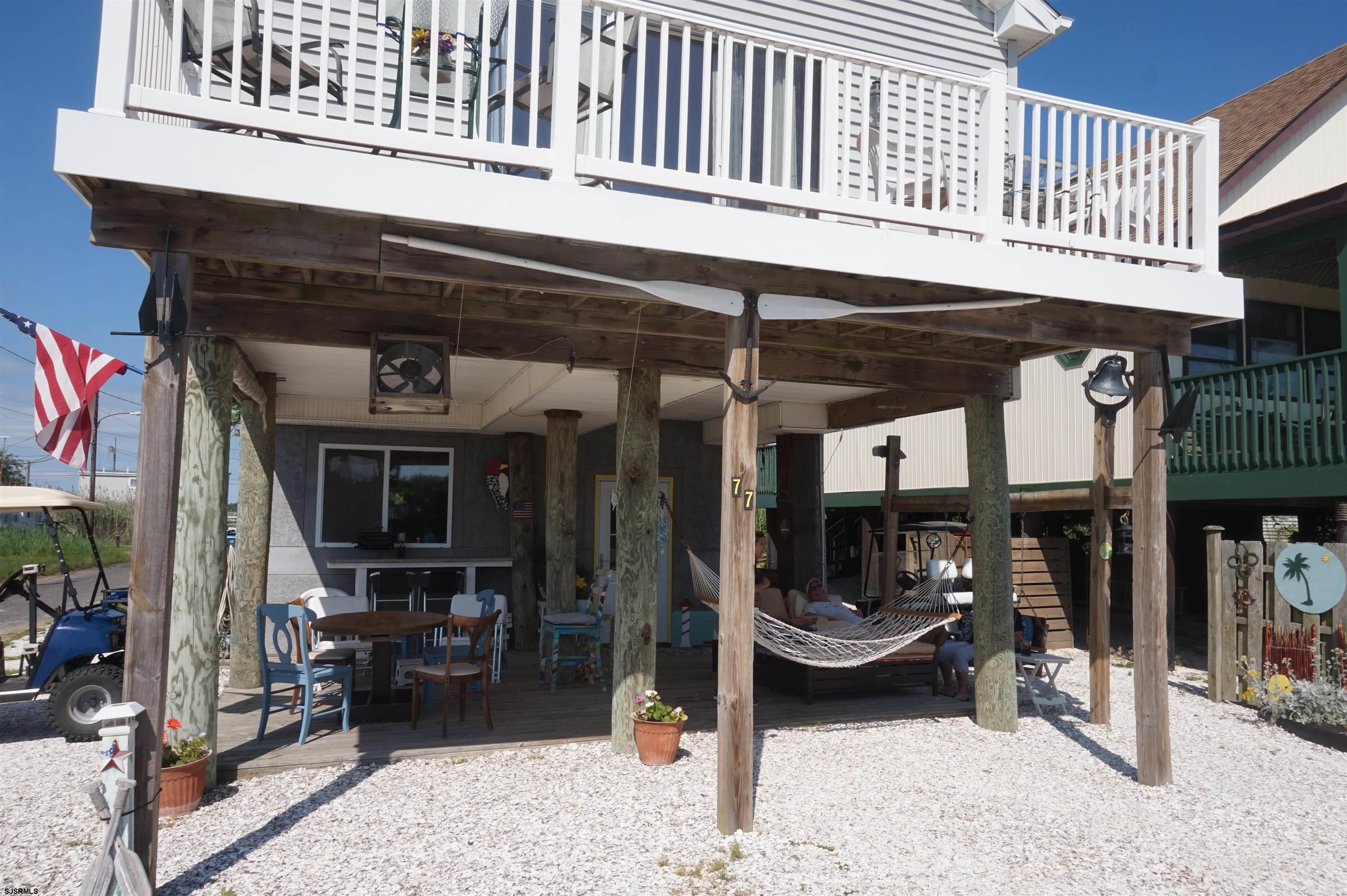77 Delaware Avenue Fortescue, NJ 08321 - Photo 3 of 47 a view of a entryway door of the building