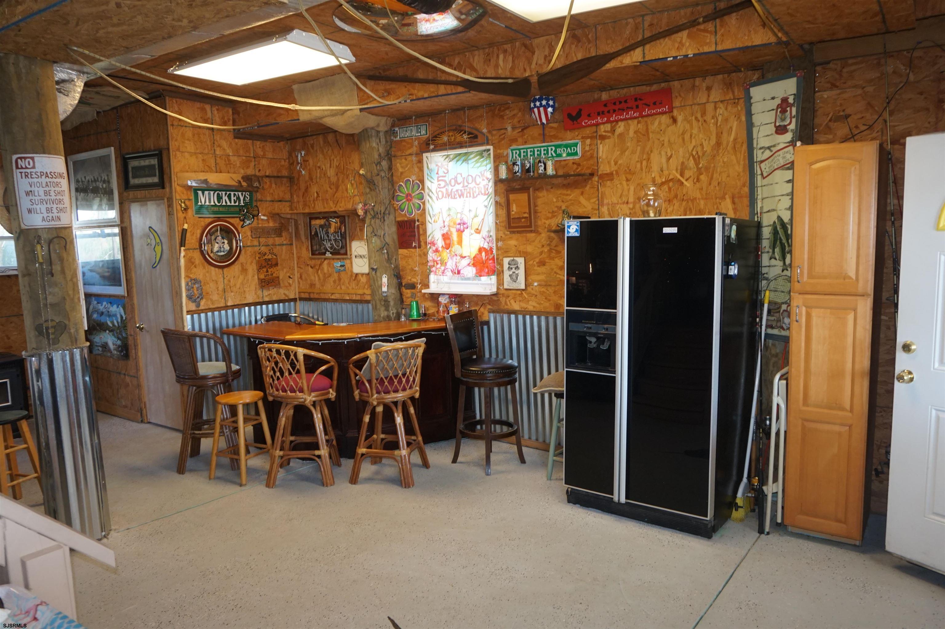 77 Delaware Avenue Fortescue, NJ 08321 - Photo 31 of 47 a view of a dining room with furniture