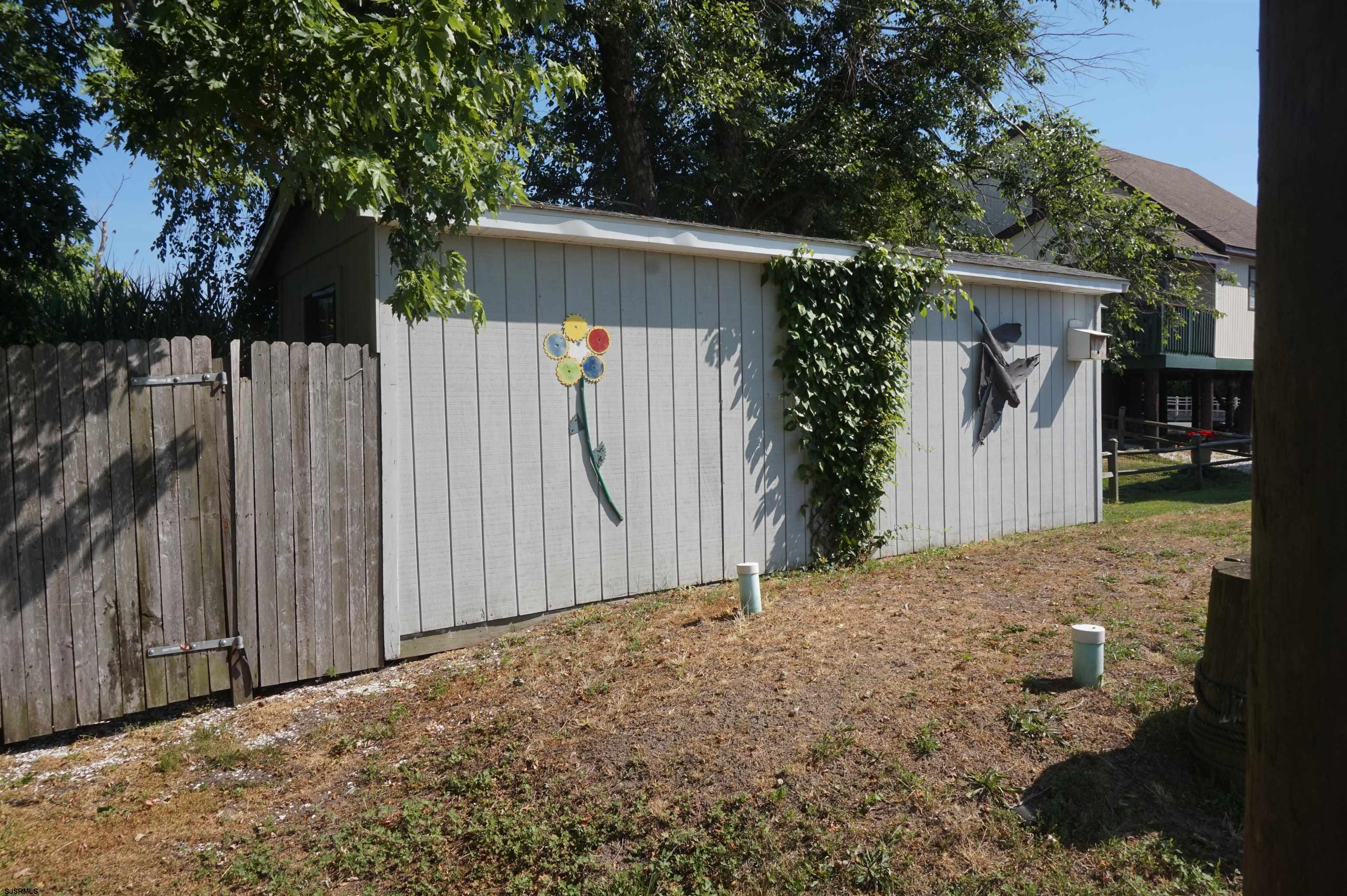 77 Delaware Avenue Fortescue, NJ 08321 - Photo 38 of 47 a backyard of a house