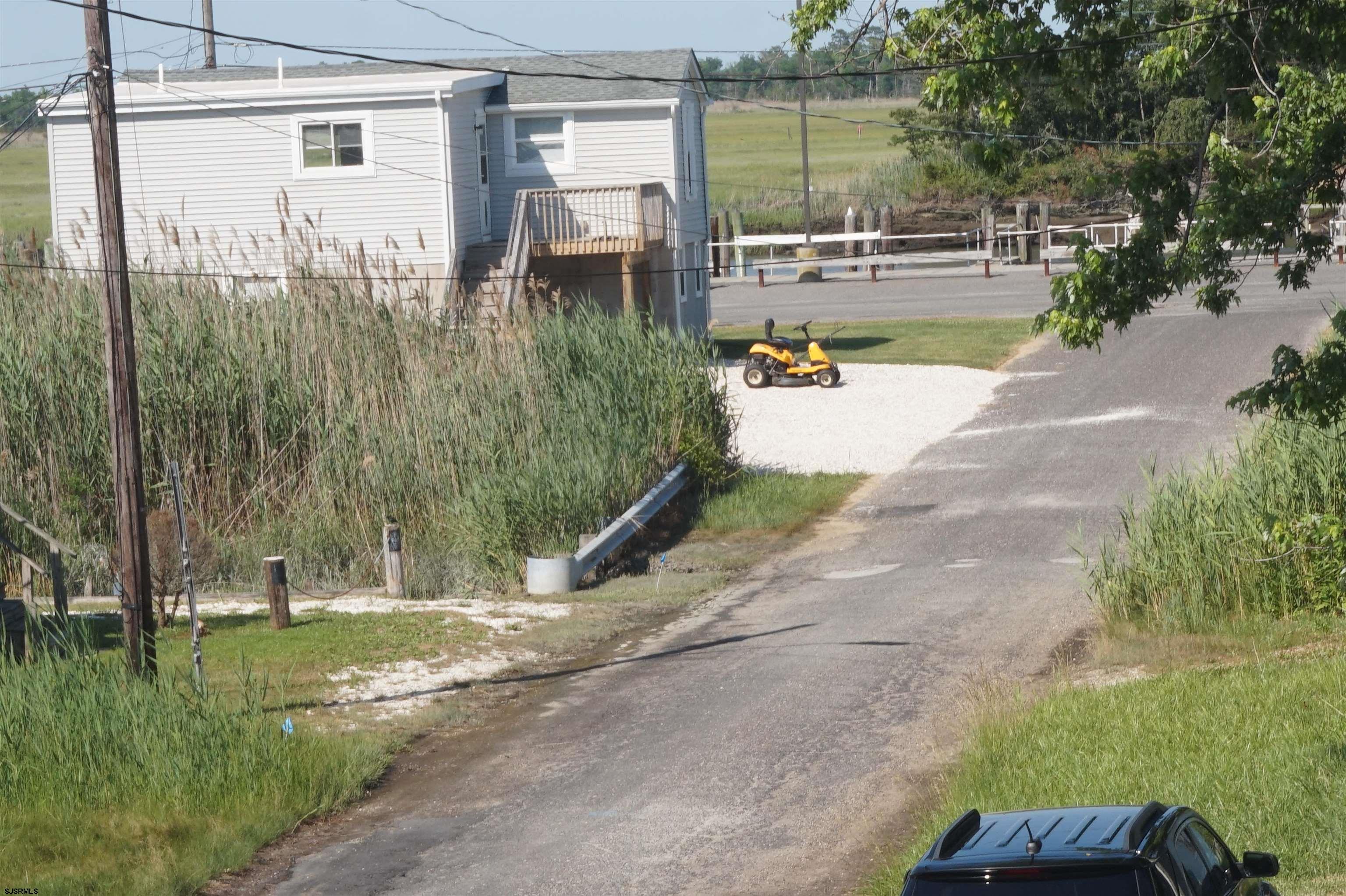 77 Delaware Avenue Fortescue, NJ 08321 - Photo 41 of 47 a view of backyard with outdoor seating