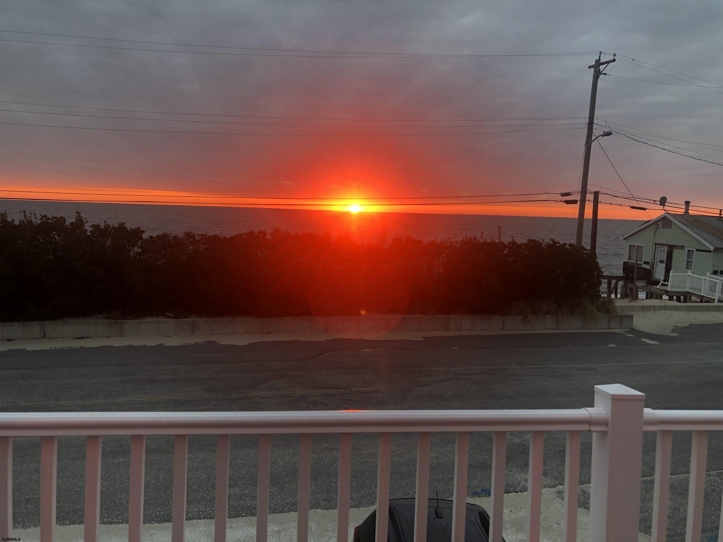 77 Delaware Avenue Fortescue, NJ 08321 - Photo 6 of 47 a view of an ocean from a balcony