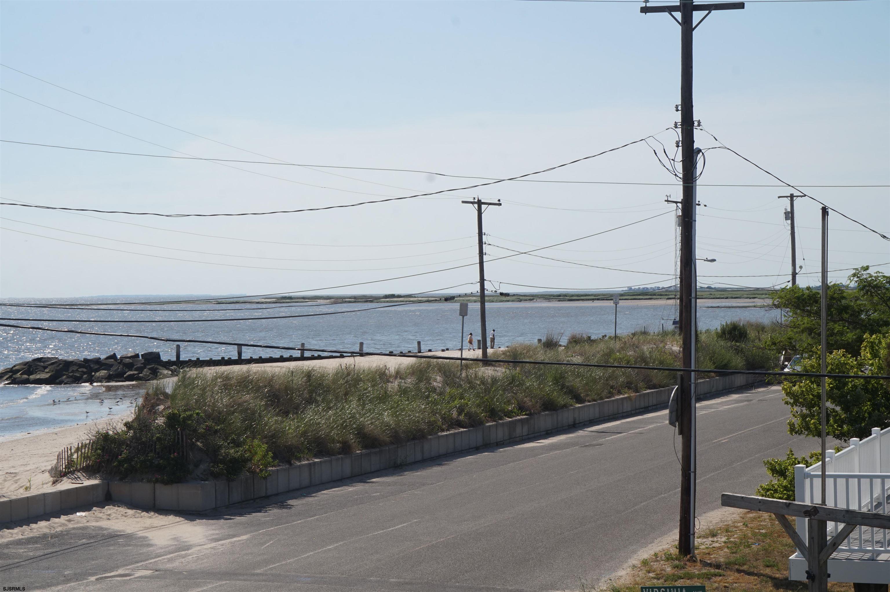77 Delaware Avenue Fortescue, NJ 08321 - Photo 10 of 47 a view of a street with an ocean view