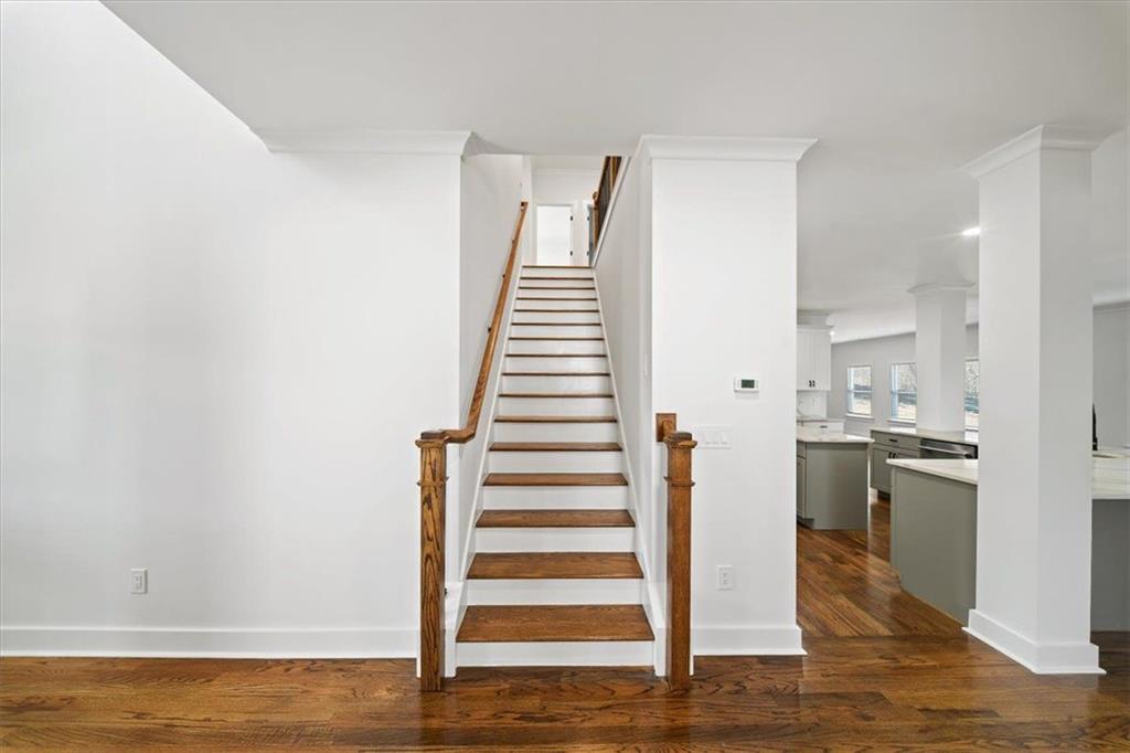 222 Silvercrest Drive Acworth, GA 30101 - Photo 18 of 73 a view of a kitchen with wooden floor and staircase