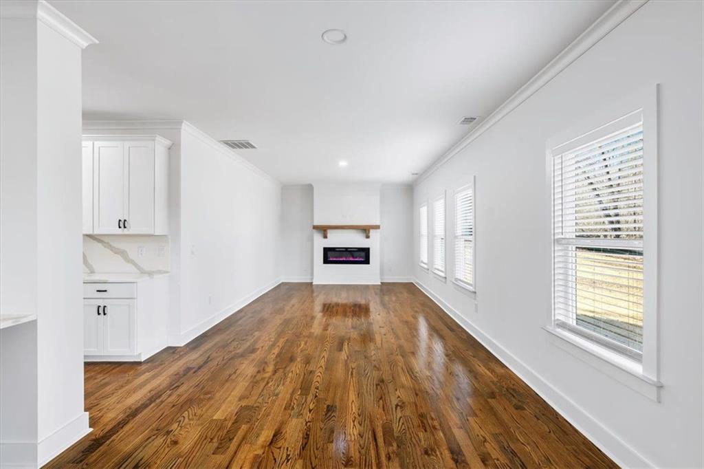 222 Silvercrest Drive Acworth, GA 30101 - Photo 32 of 73 a view of empty room with wooden floor and window