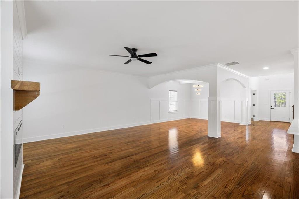 222 Silvercrest Drive Acworth, GA 30101 - Photo 35 of 73 a view of an empty room with wooden floor and a ceiling fan