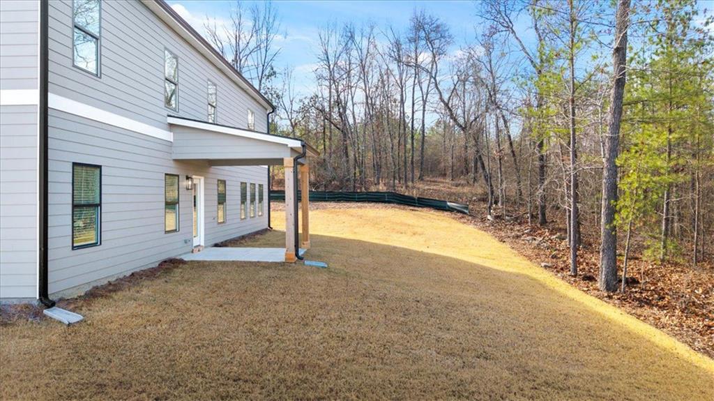 222 Silvercrest Drive Acworth, GA 30101 - Photo 36 of 61 a view of a house with backyard and sitting area