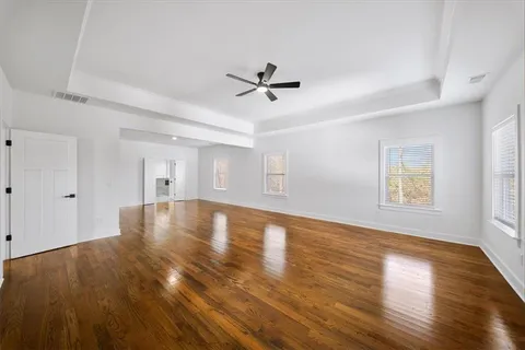 a view of a house with a tree
