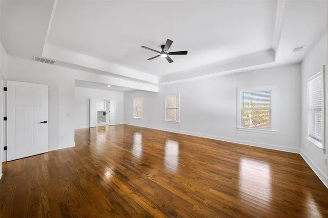 a view of a house with a tree