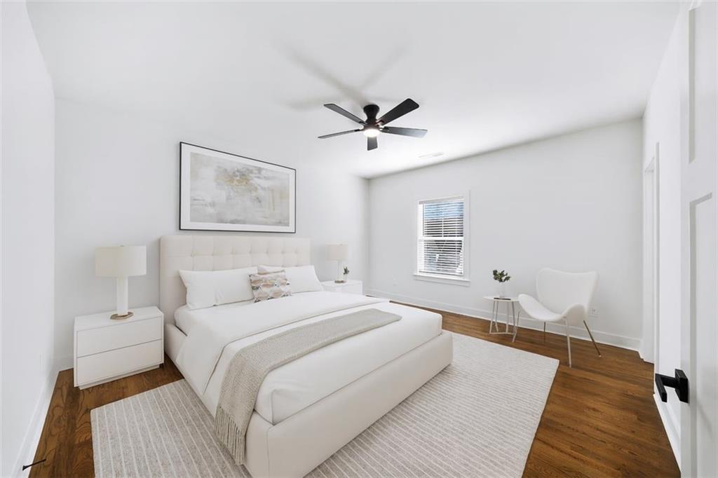 222 Silvercrest Drive Acworth, GA 30101 - Photo 44 of 73 a bedroom with a bed and a ceiling fan