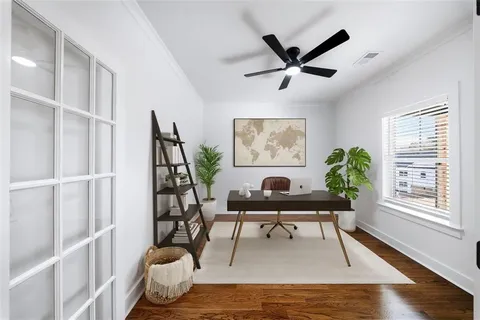 a large kitchen with kitchen island a sink stainless steel appliances and cabinets