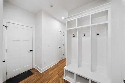 a kitchen that has a sink and a stove in it