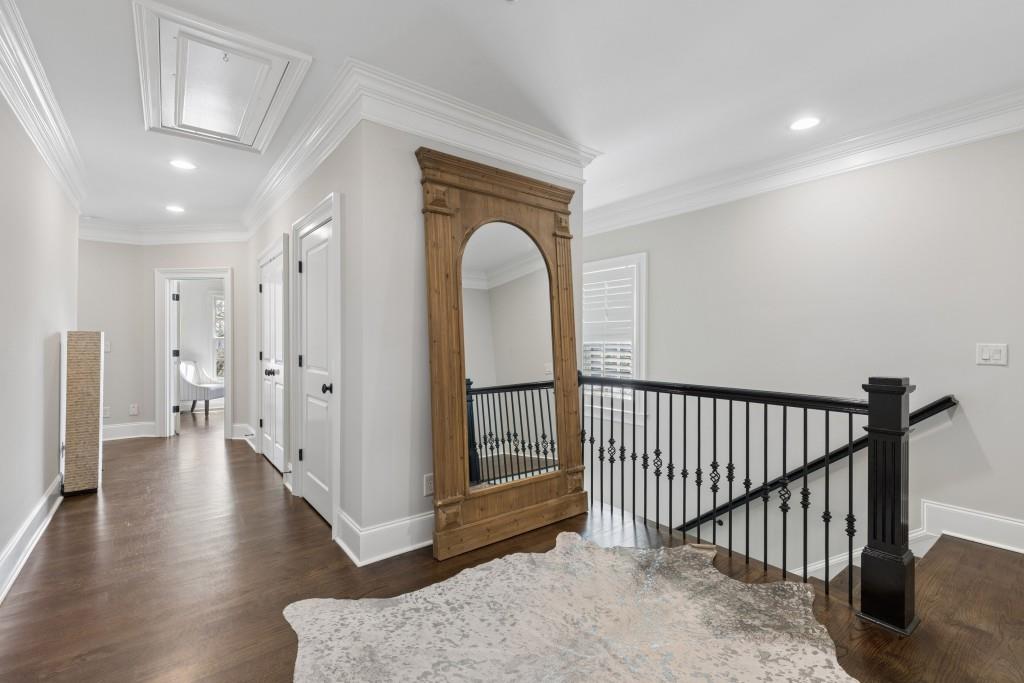 3585 Roxboro Road Northeast, Unit 6 Atlanta, GA 30326 - Photo 26 of 51 a view of a hallway with wooden floor windows and entryway