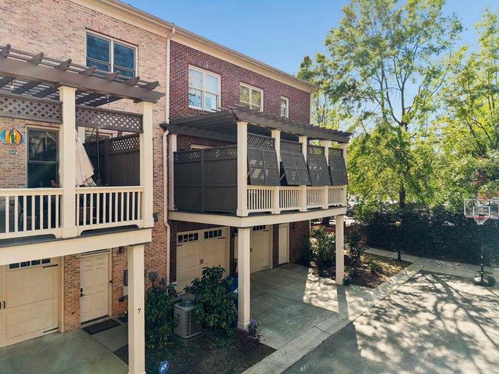 3585 Roxboro Road Northeast, Unit 6 Atlanta, GA 30326 - Photo 45 of 51 front view of a house with a yard