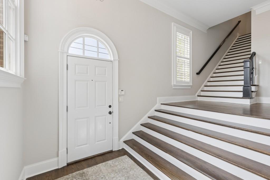 3585 Roxboro Road Northeast, Unit 6 Atlanta, GA 30326 - Photo 8 of 51 a view of entryway with wooden floor