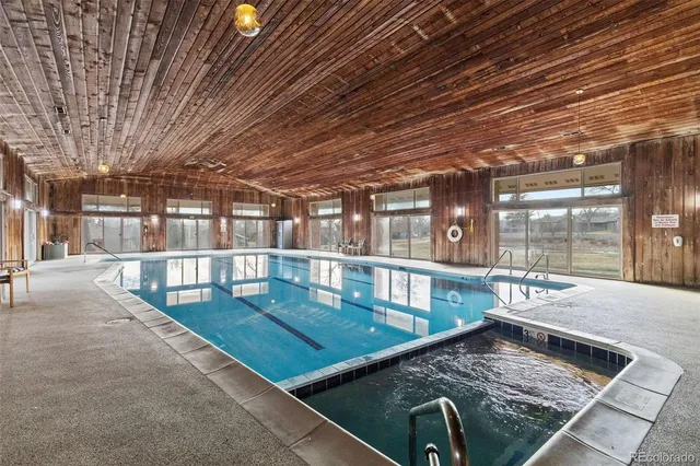 a view of a swimming pool with a patio