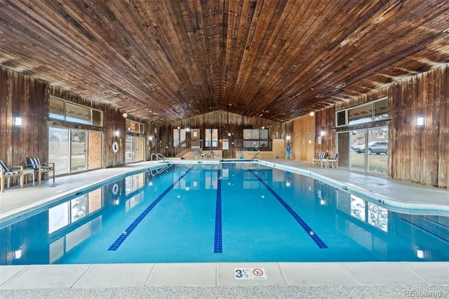 a view of a living room kitchen with a sink