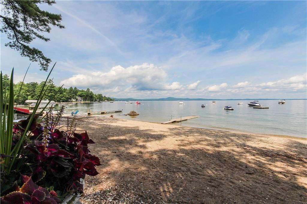 111 Sandy Cove Road, Unit D Standish, ME 04084 - Photo 11 of 35 Wide beach includes dock, raft, and...
