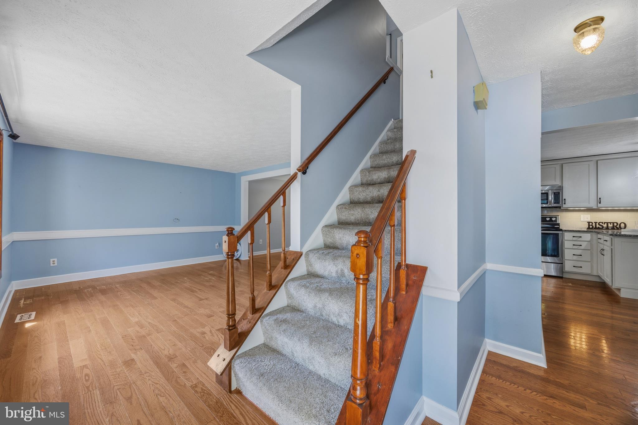 1506 Gollum Road Hanover, MD 21076 - Photo 5 of 44 a view of entryway and hall with wooden floor